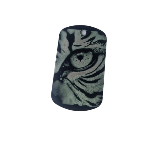 Dog tag with tiger eye design on a white background