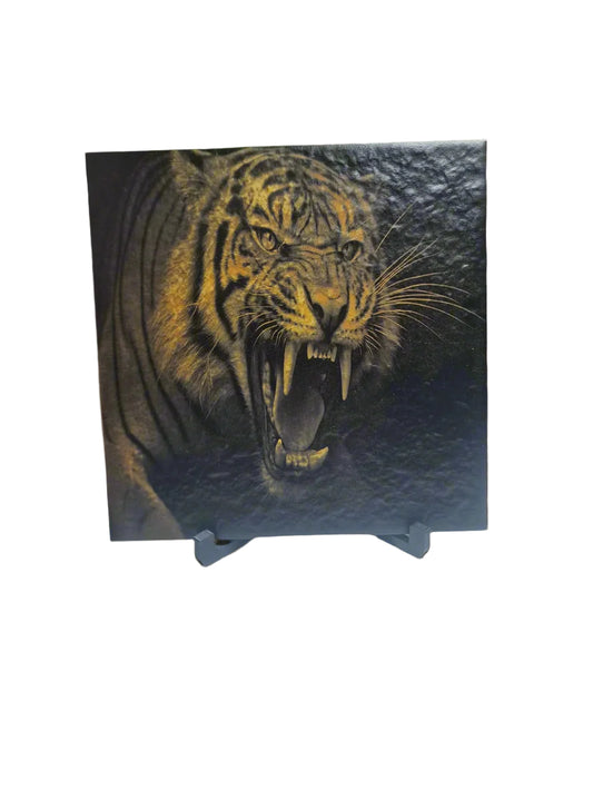 Tiger painting on a textured surface with a blurred indoor background